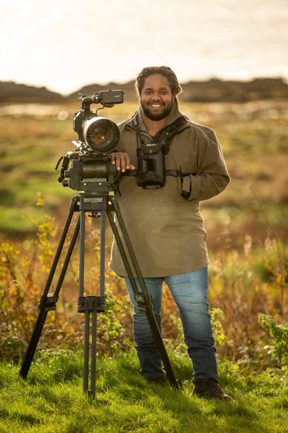 an image of a cameraman outdoors
