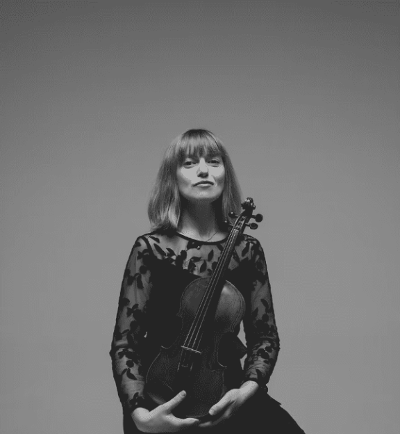 an image of a woman with a violin