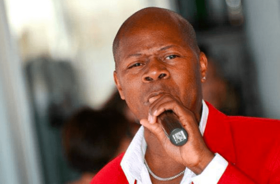 An image of a man with a microphone