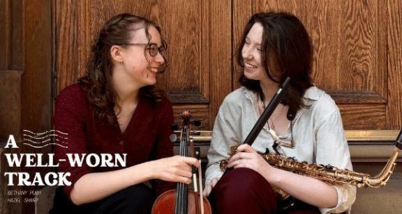 an image of 2 female musicians with their instruments