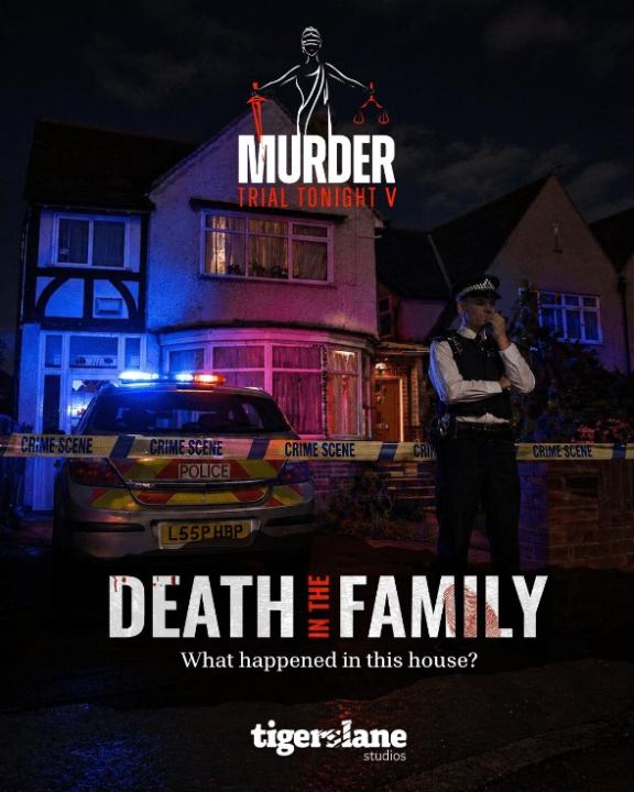 a policeman stands outside a house with crime scene tape and a police car 