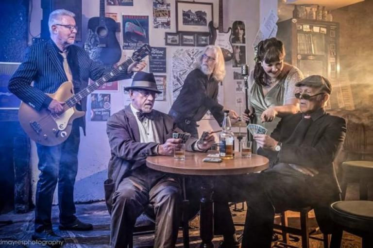 A blues band playing a bar.