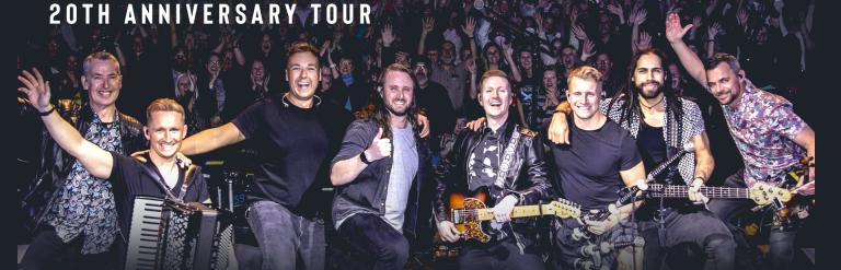 A picture of the band Skerryvore in front of a crowd